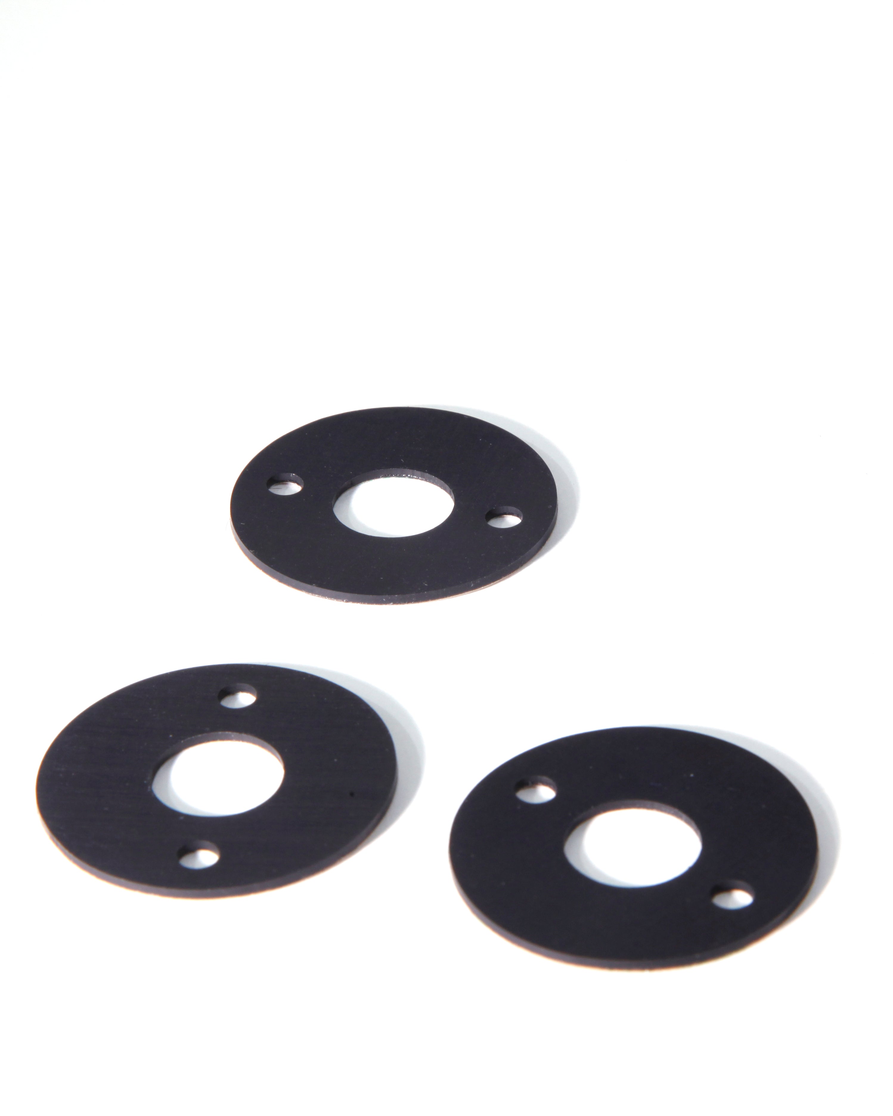 Self-stick perforated rubber pad