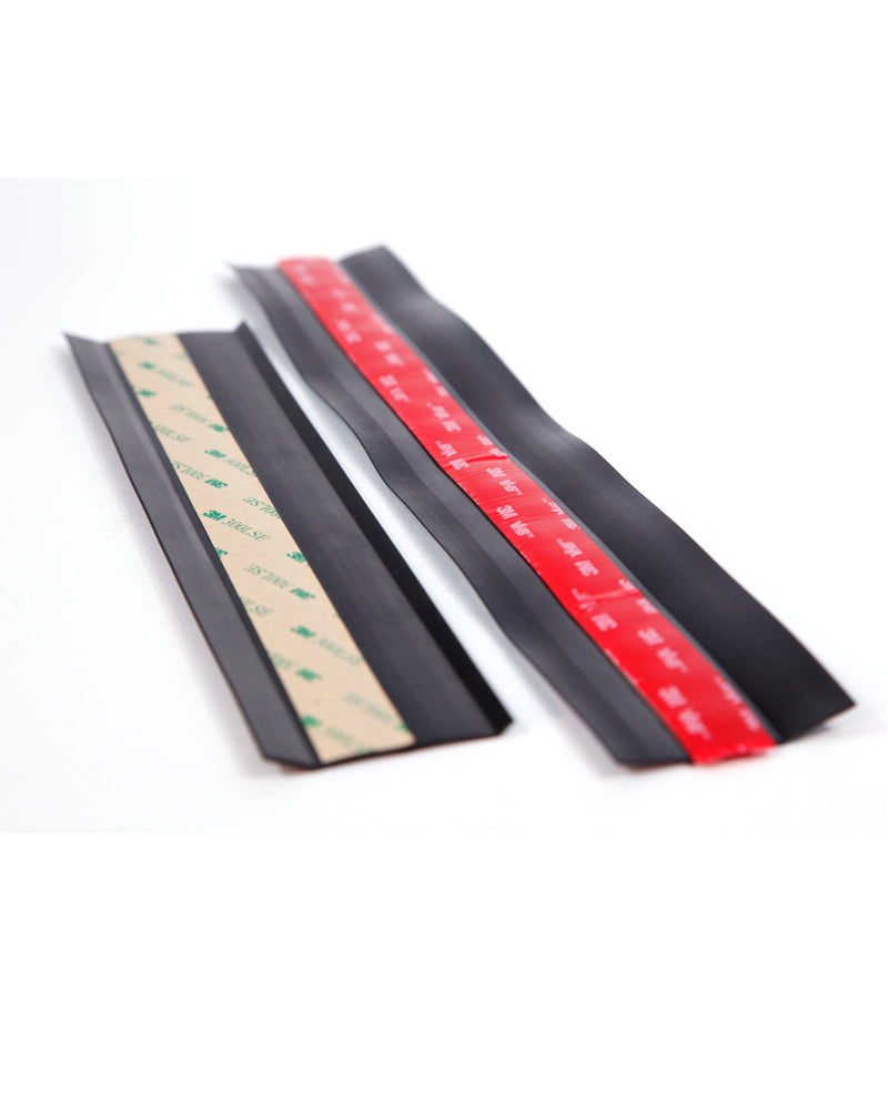 Multi-surface rubber sealing strip with adhesive backing