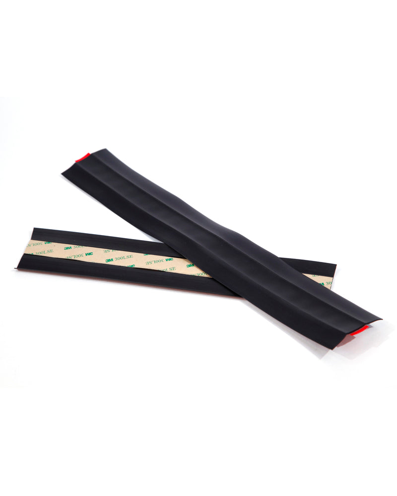 Multi-surface rubber sealing strip with adhesive backing