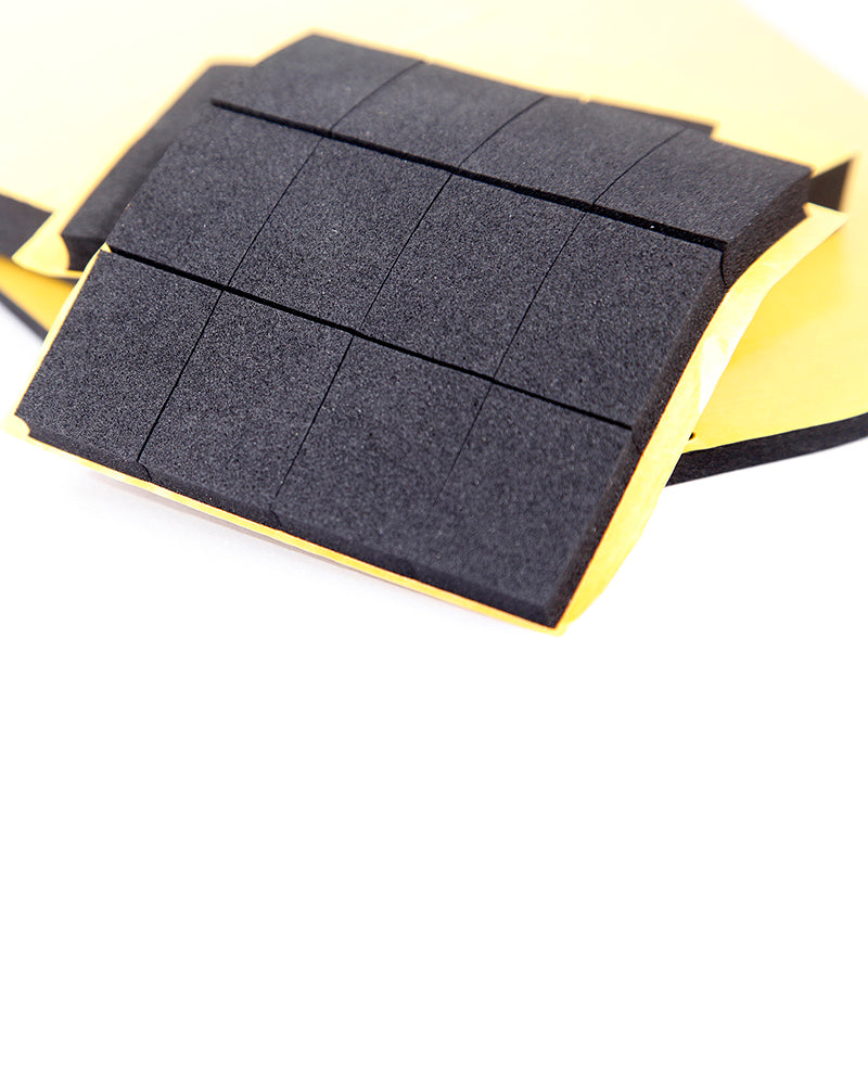 Adhesive-backed foam rubber products